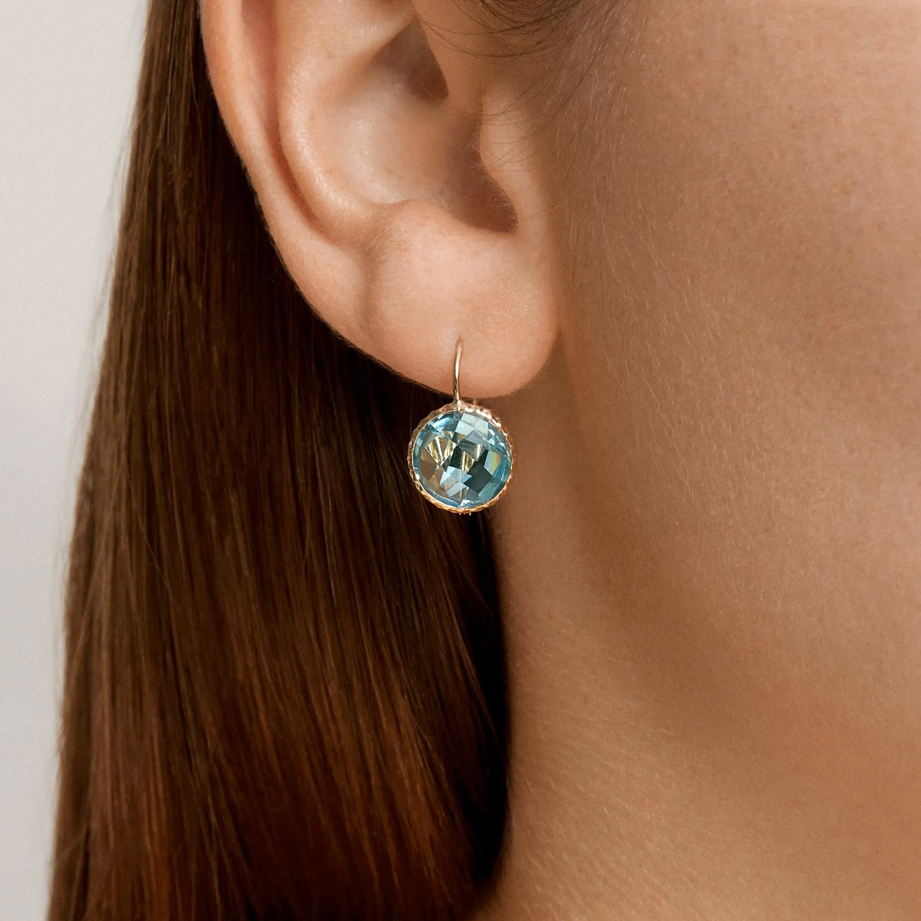 14KT White Gold Blue Topaz Earrings