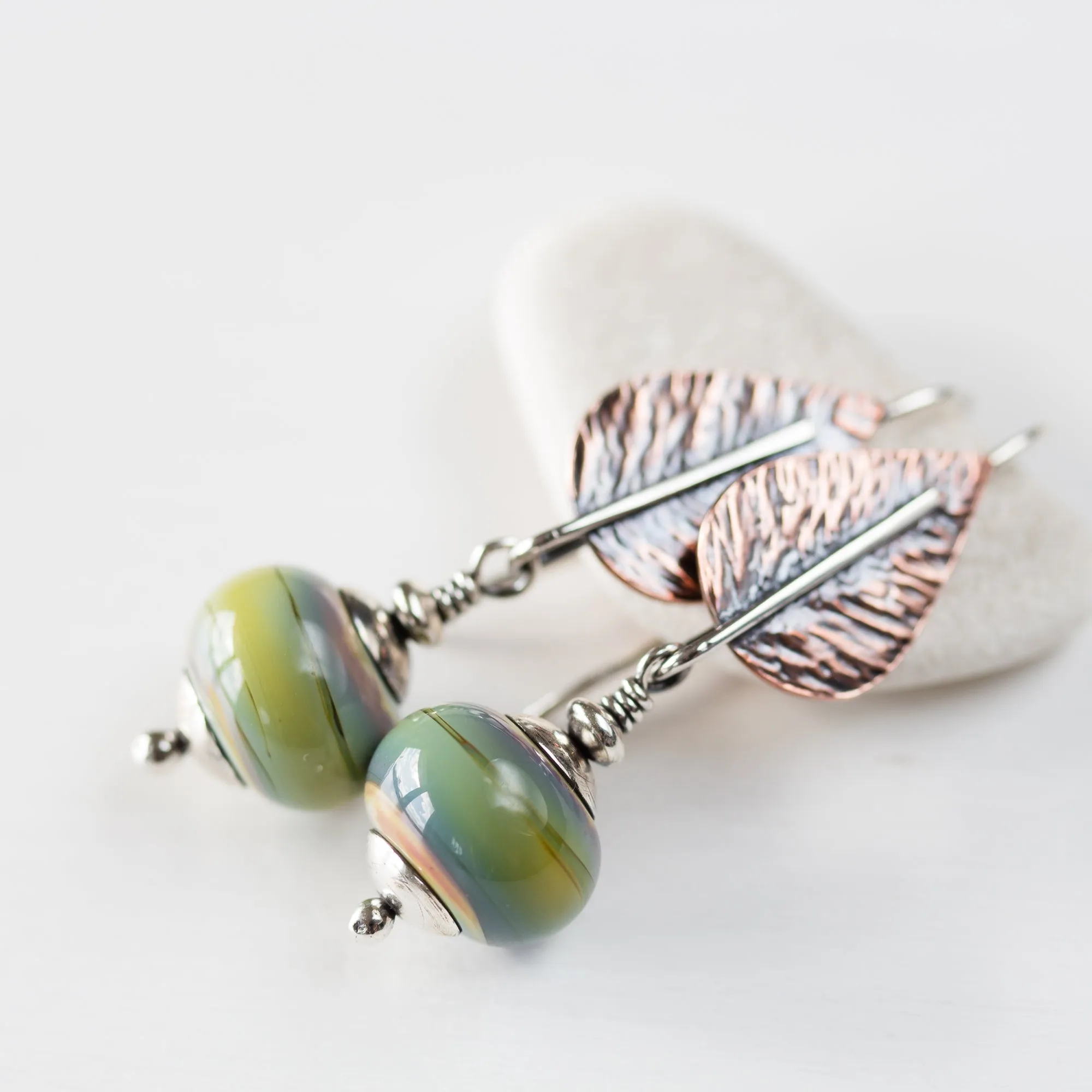 Pastel Green Earrings, hammered copper leaf with lampwork beads