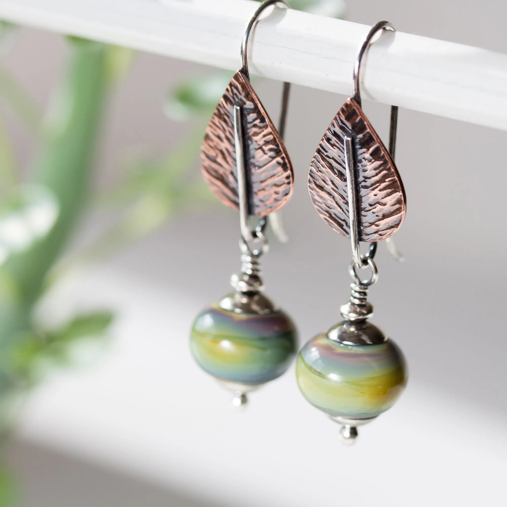 Pastel Green Earrings, hammered copper leaf with lampwork beads